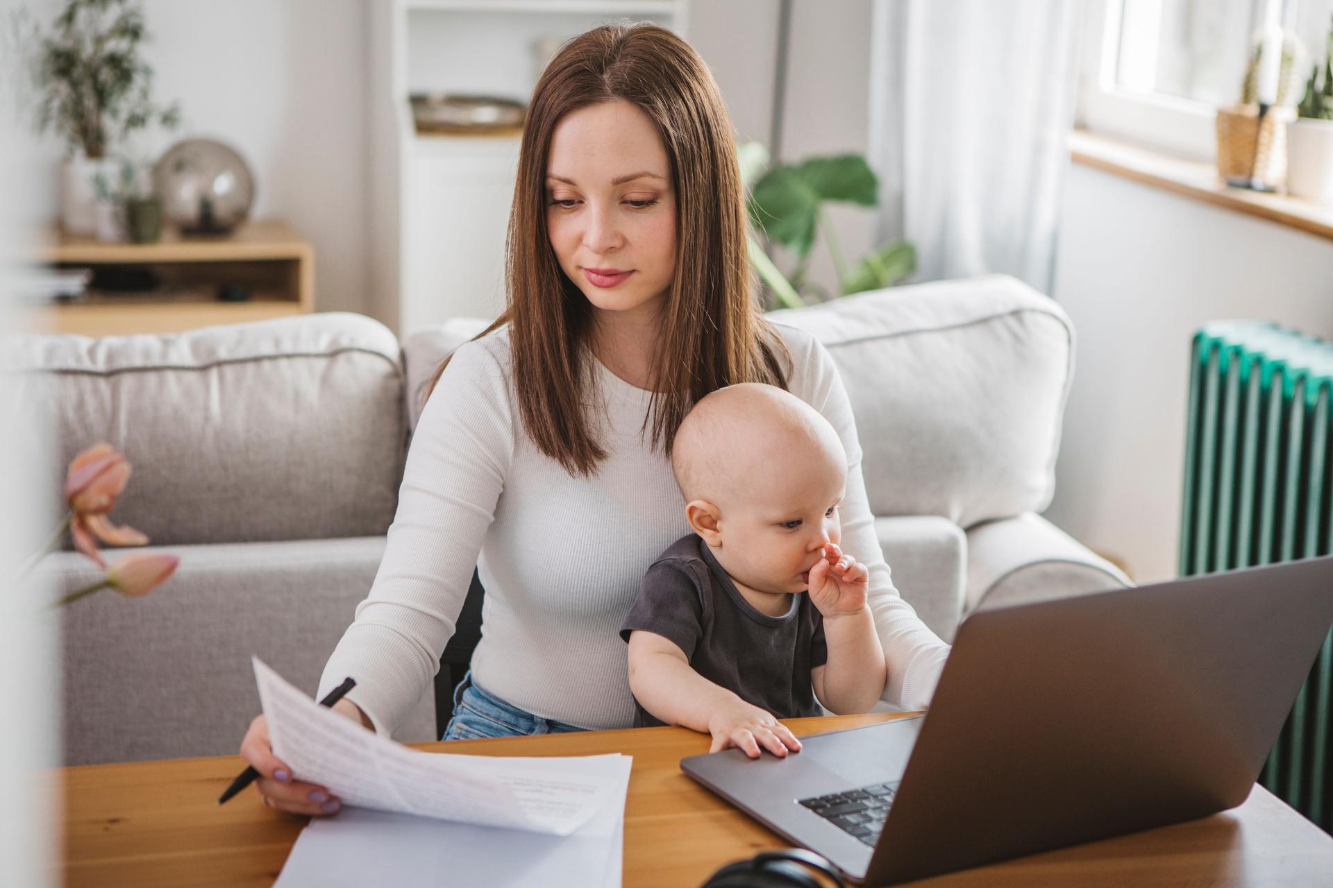 Young mother working from home